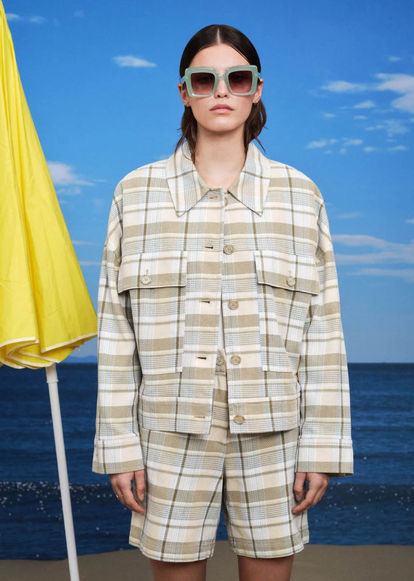 A female posing in Marc O'Polo outfit