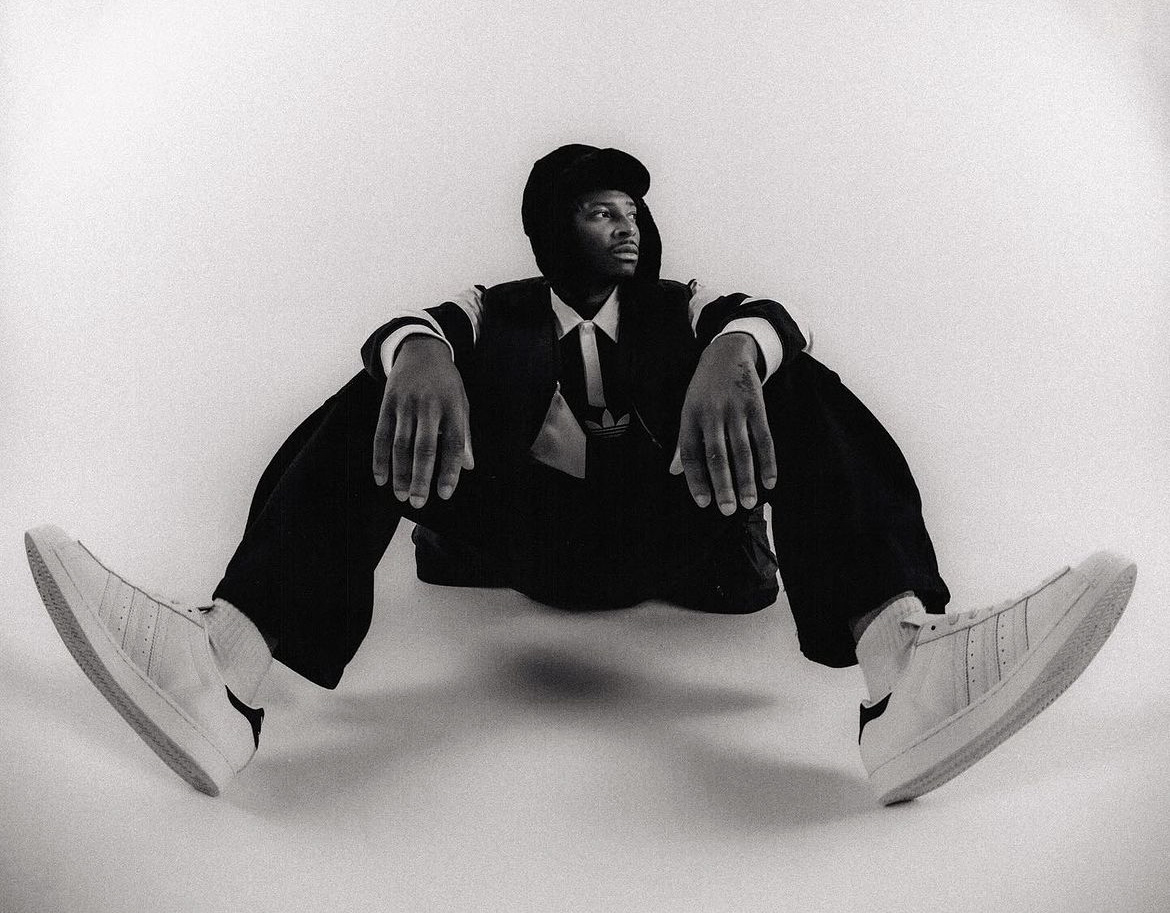 Black male model posing for black friday campaign of defshop