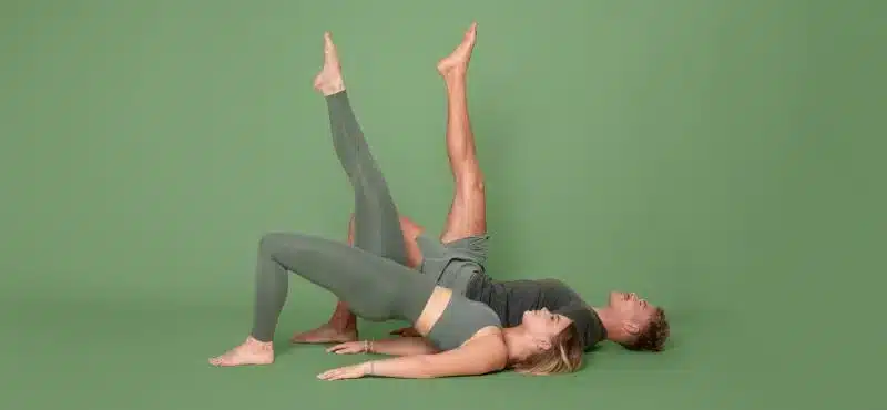 Gymondo fitness enthusiasts, Julia and Joey doing strength exercise