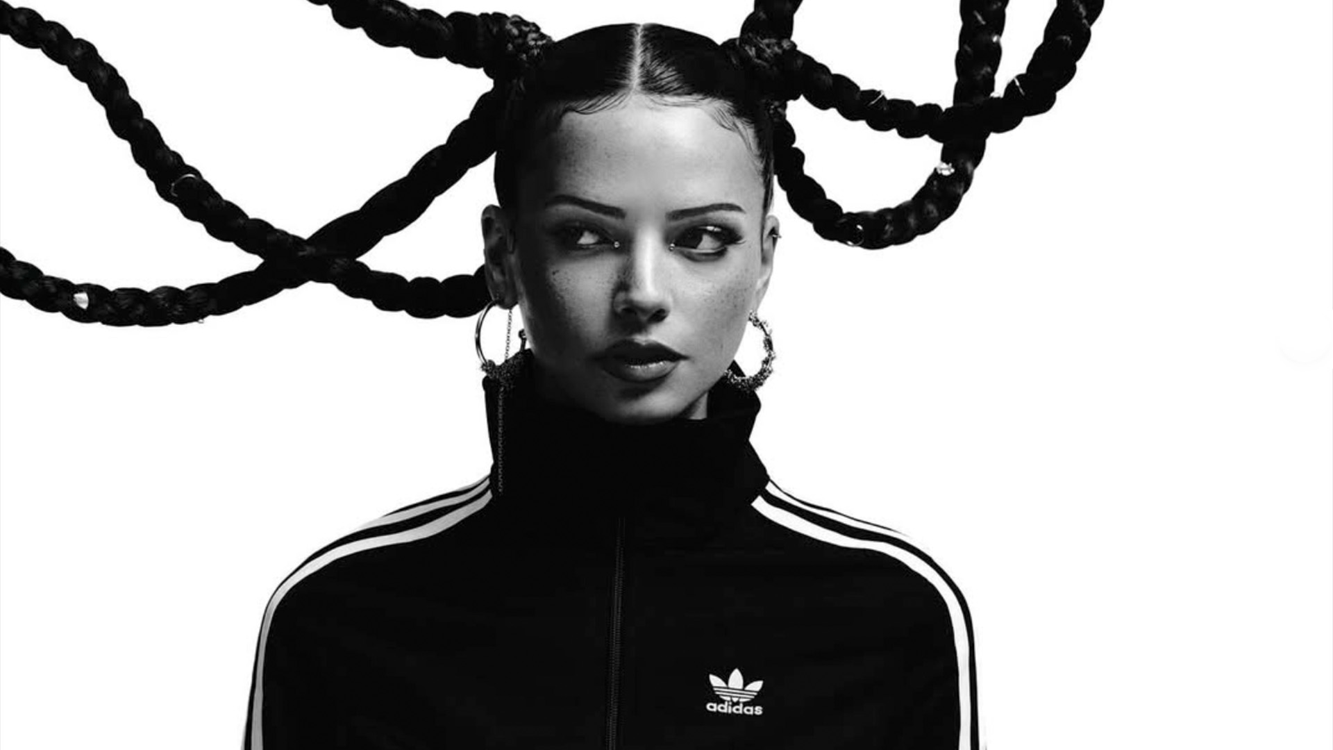 Close-up of Nina Chuba for Adidas Superstar campaign, photographed at raw studios Berlin, highlighting iconic Adidas tracksuit in fotostudio berlin.