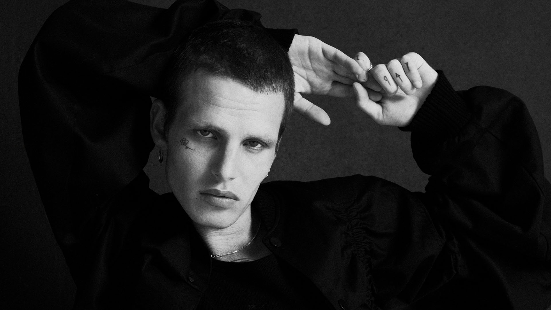 Model wearing nowrubi capsule collection in black jacket, photographed by Bert Spangemacher at raw studios – fashion shoot in rental studios Berlin.