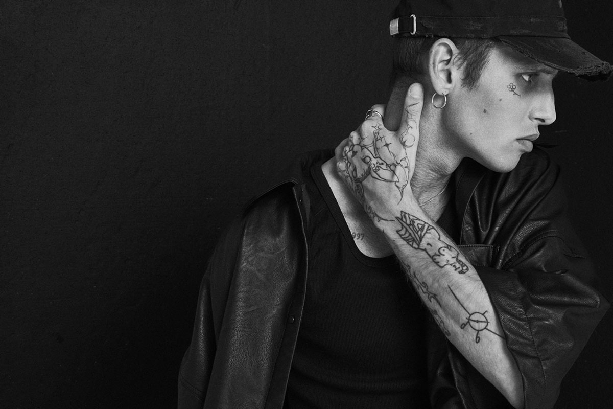 nowrubi at raw studios by bert spangemacher 4 Model wearing nowrubi capsule collection photographed at raw studios by Bert Spangemacher – black leather shirt and cap, fashion shoot in Berlin Foto Studio.