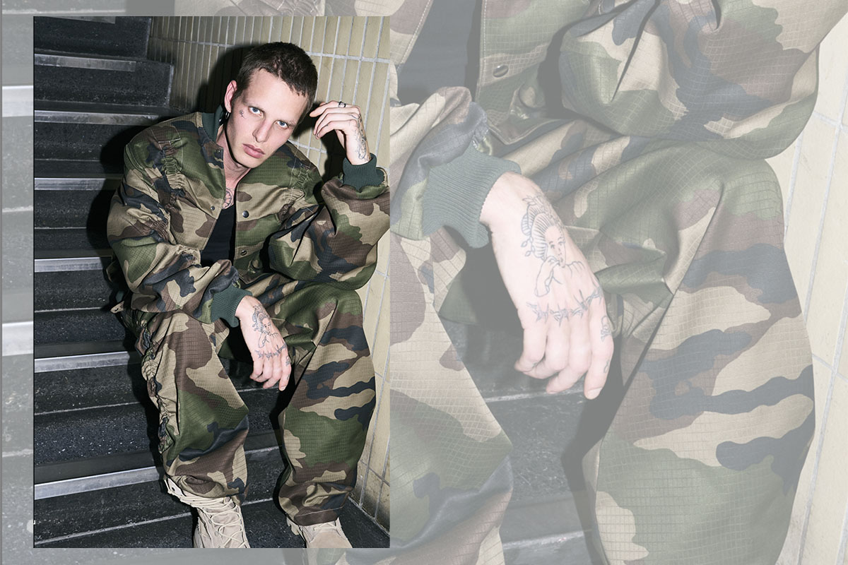 nowrubi at raw studios by bert spangemacher 6 Model in camouflage jumpsuit from nowrubi capsule collection photographed at raw studios by Bert Spangemacher – contemporary fashion shoot in Berlin Foto Studio.