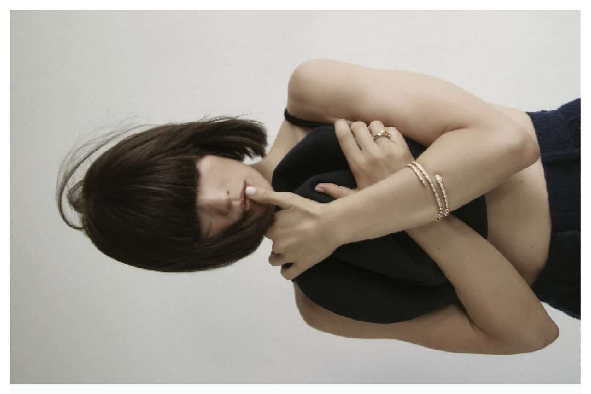 zoo magazine Emilia Schüle 5 Close-up of Emilia Schüle in a minimalist studio setting, photographed for ZOO Magazine by Eric Asamoah at raw studios Berlin.